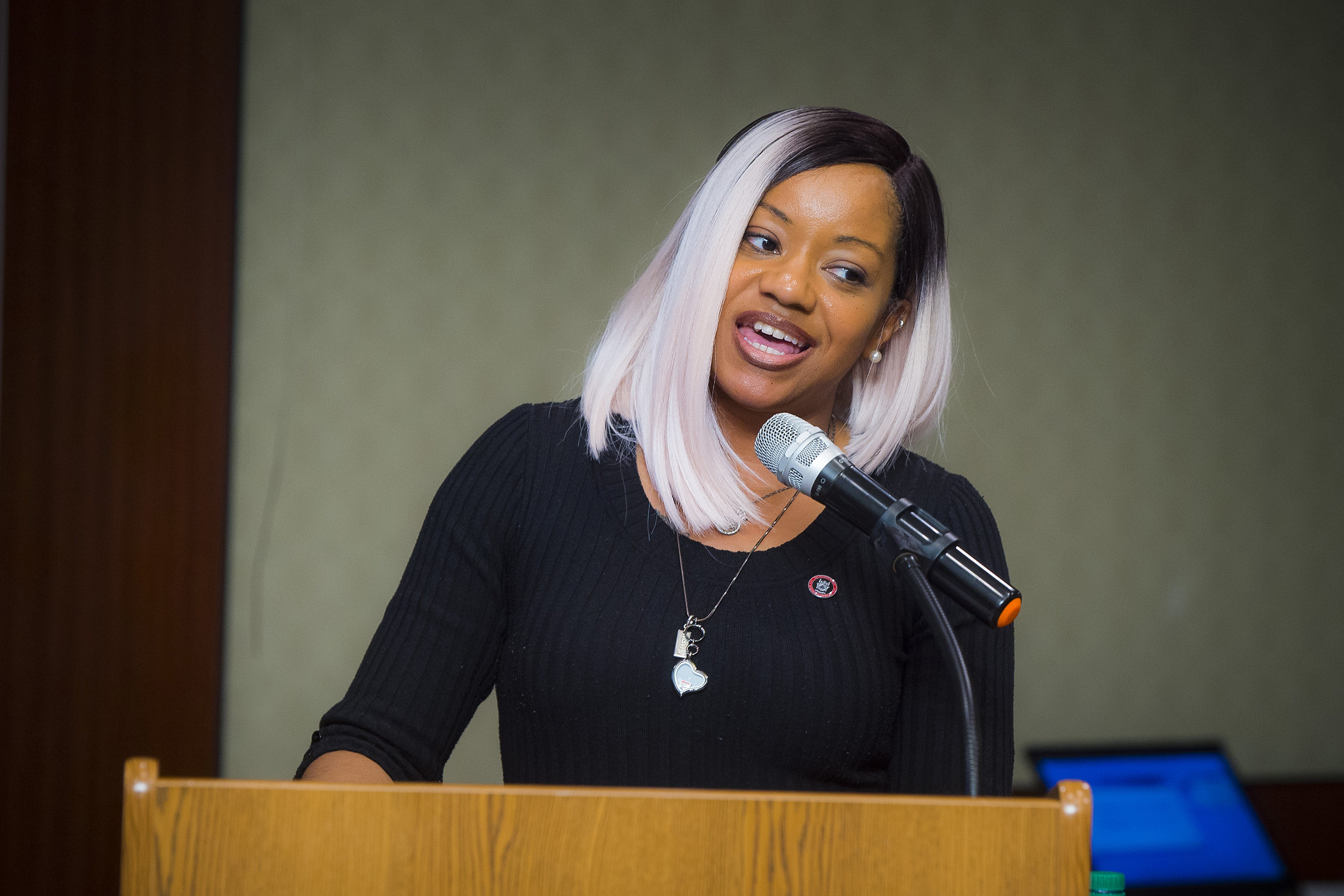 Koral Booth speaking during the NSLS Induction ceremony.