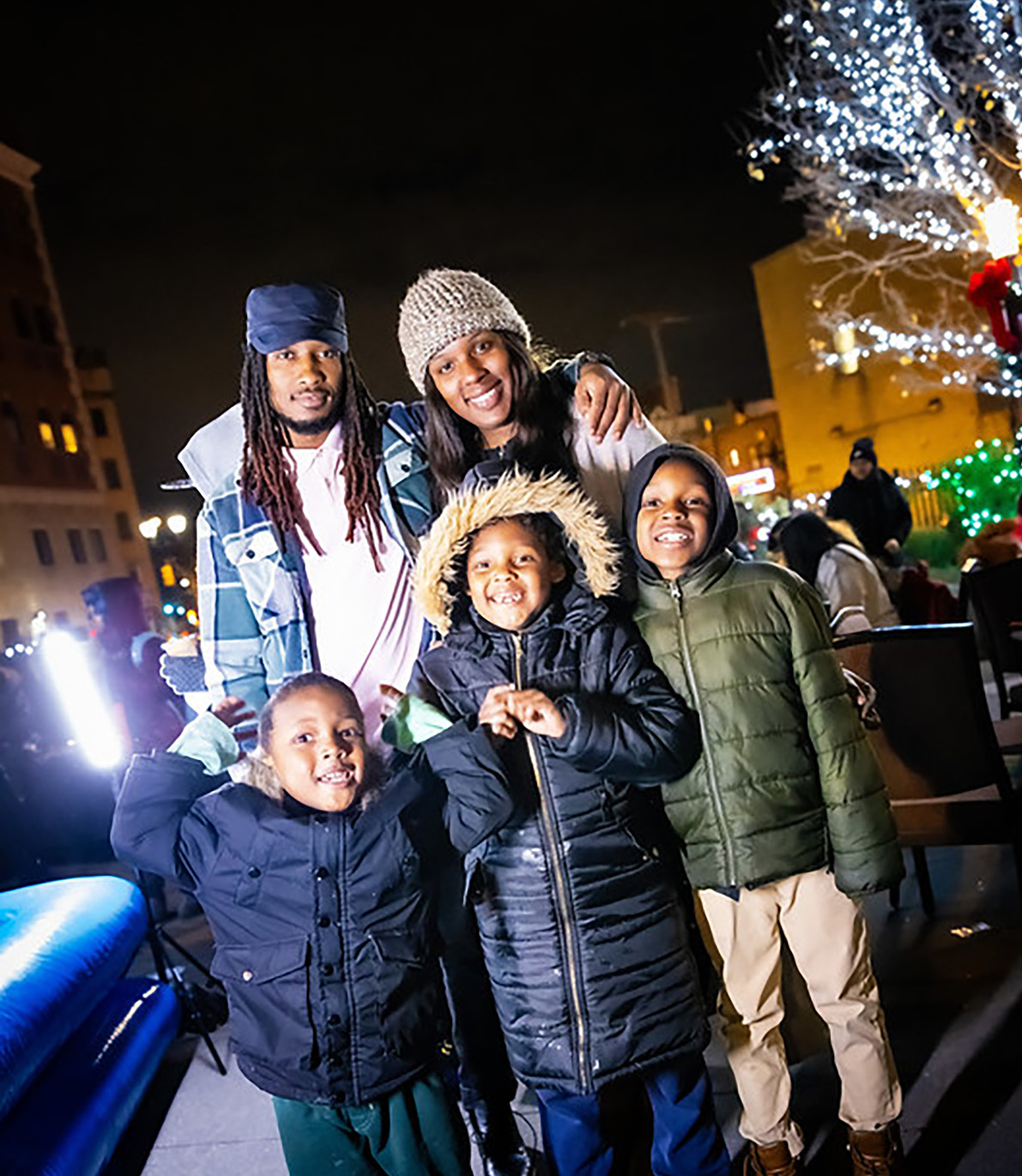 HCCC student parent and peer leader Hannah Allen with her family at HCCC’s holiday tree lighting ceremony.