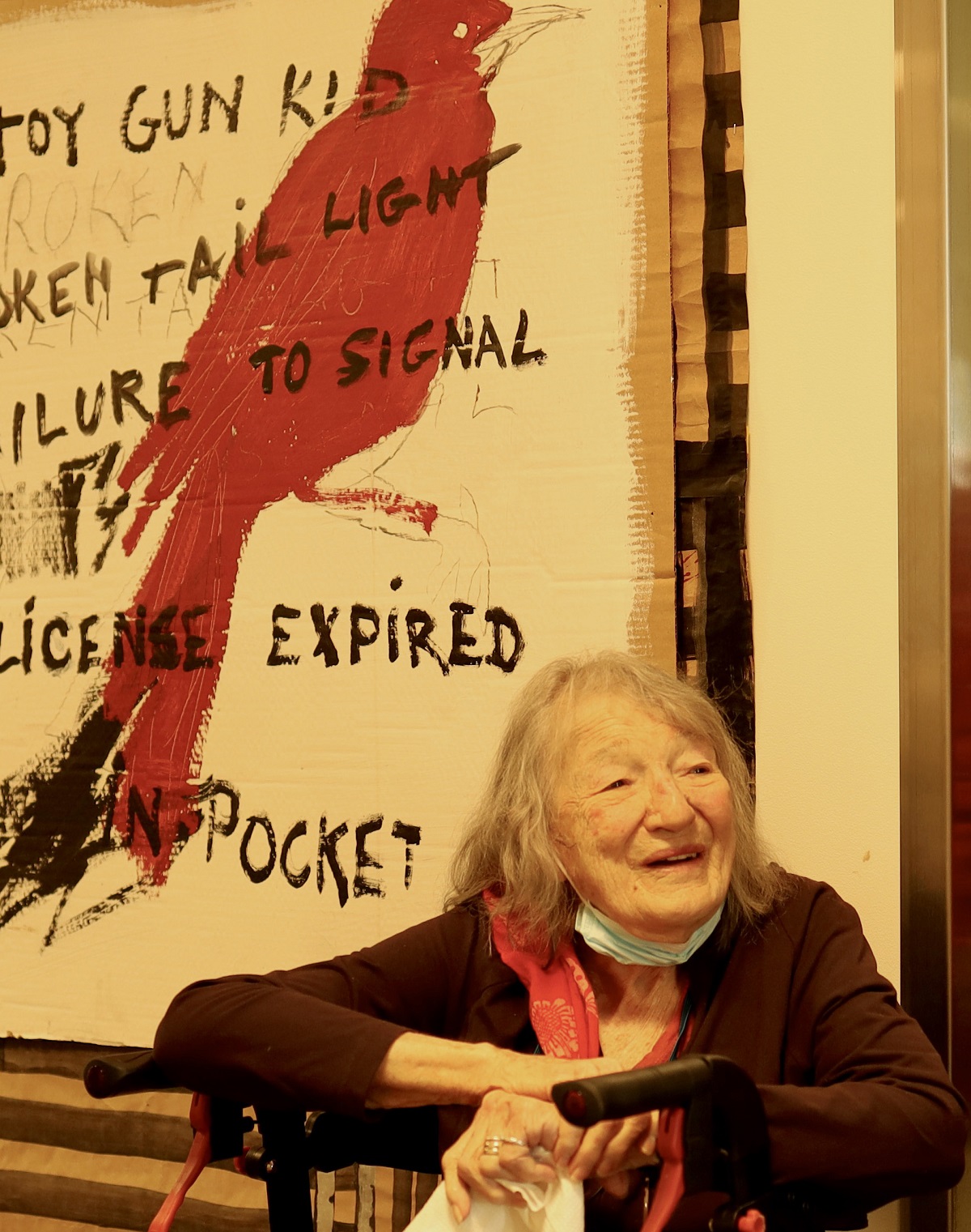 Pictured here, artist Henrietta Mantooth, and one painting from the “Jail Birds” series she donated to the Hudson County Community College Foundation Permanent Art Collection.