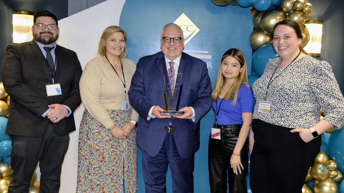 John Urgola, HCCC Director of Institutional Research and Planning; Dr. Gretchen Schulthes, HCCC Director of Advisement; Dr. Christopher Reber, HCCC President; Natalie Jimenez, HCCC student and “Hudson Scholars” participant; and Mackenzie Johnson, “Hudson Scholars” Academic Counselor.