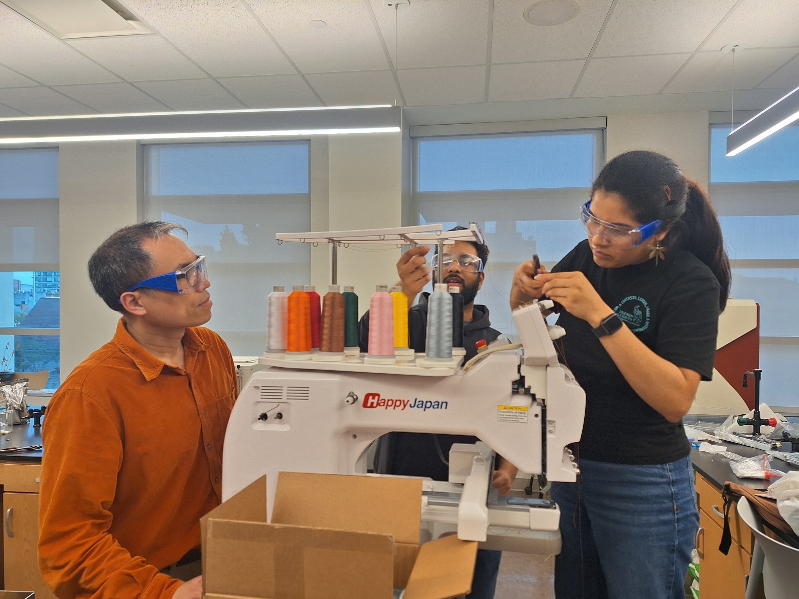 Dr. Clive Li with Dillon Singh and Camila Pazmino Izquierdo