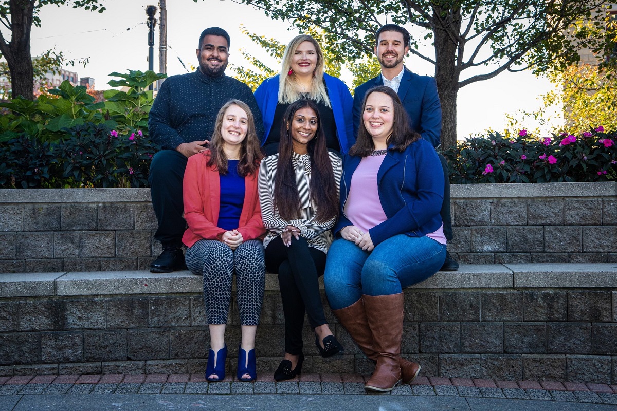 Pictured in foreground from left: “Hudson Scholars” counselors Elizabeth Ryan, Alyssa Rupnarain, and Mackenzie Johnson. In background at left and right: “Hudson Scholars” counselors Nicholas Mangal and Richard Remoura; center: Dr. Gretchen Schulthes, Associate Director, HCCC Advisement and Transfer.