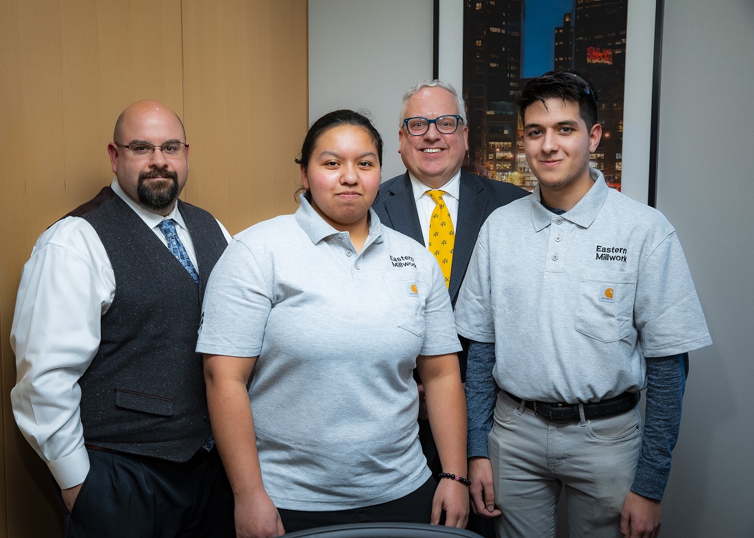 Thomas Edison State University Vice Provost for Strategic Initiatives and Institutional Effectiveness, Dr. Jeffrey Harmon and Hudson County Community College President, Dr. Christopher Reber are seen here with Holz Technik Advanced Manufacturing Apprenticeship Program student-apprentices, Amber Gutierrez and Amar Arslanovic.