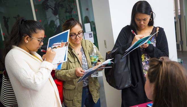 Students filling a form